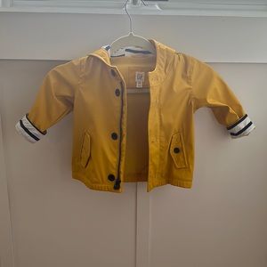 Baby Gap Yellow Raincoat . navy and white striped cuffs and hood lining. 18-24 m